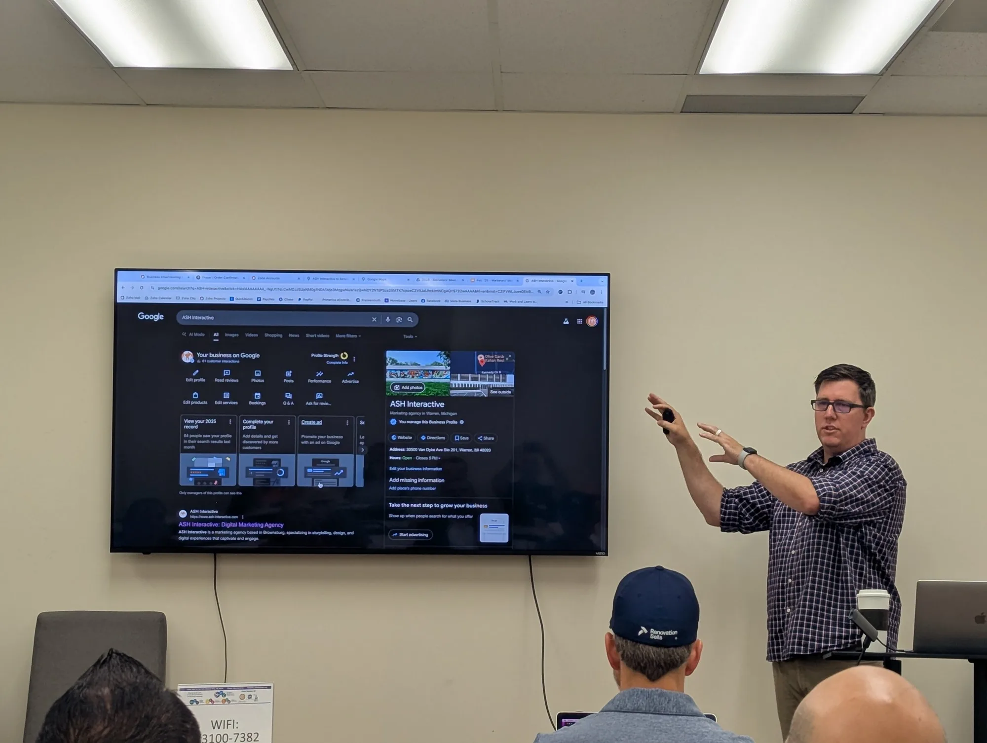 Presenter walking attendees through a screen at a marketing meetup