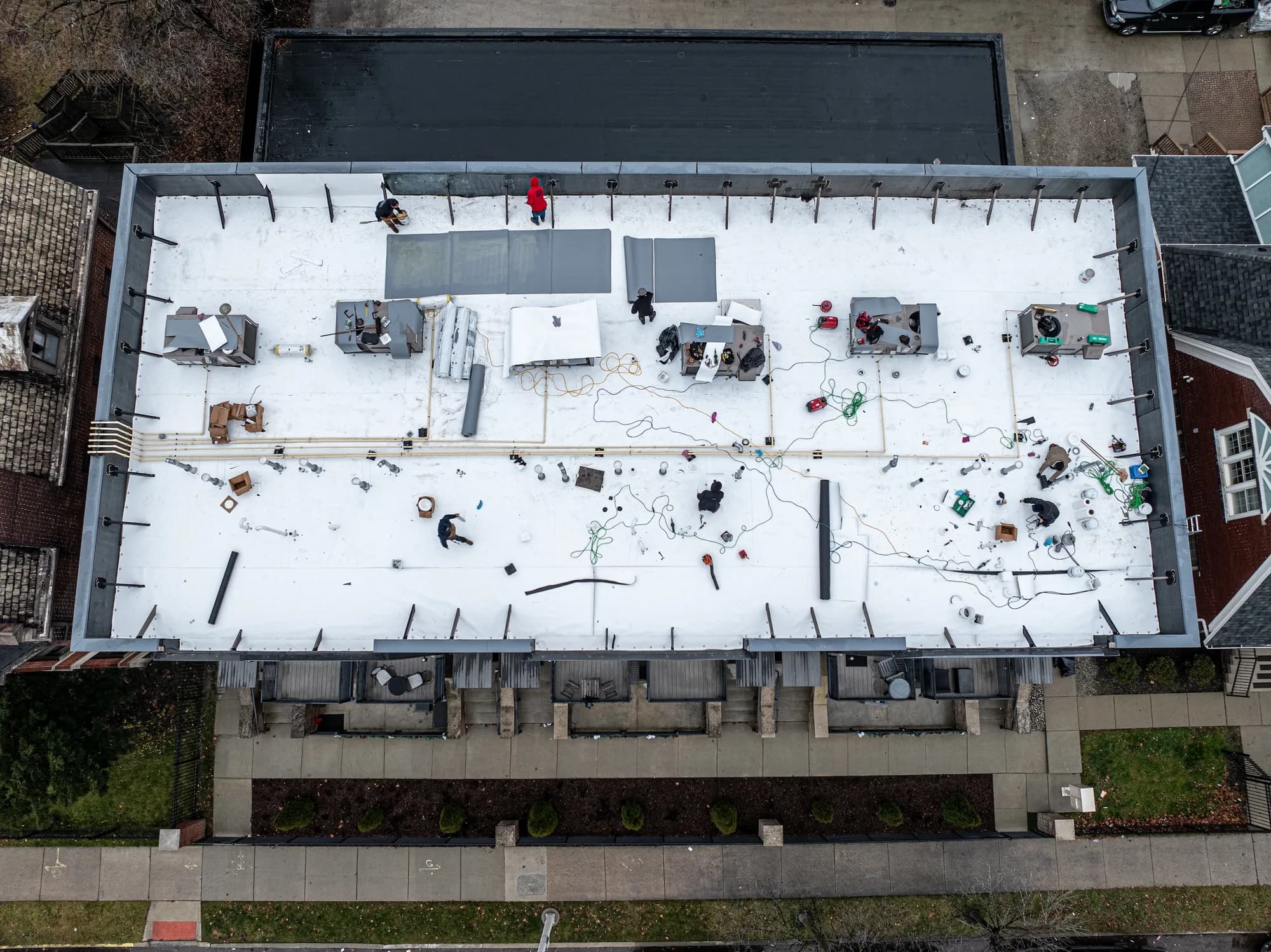 Flat roof replacement on a townhome building, after