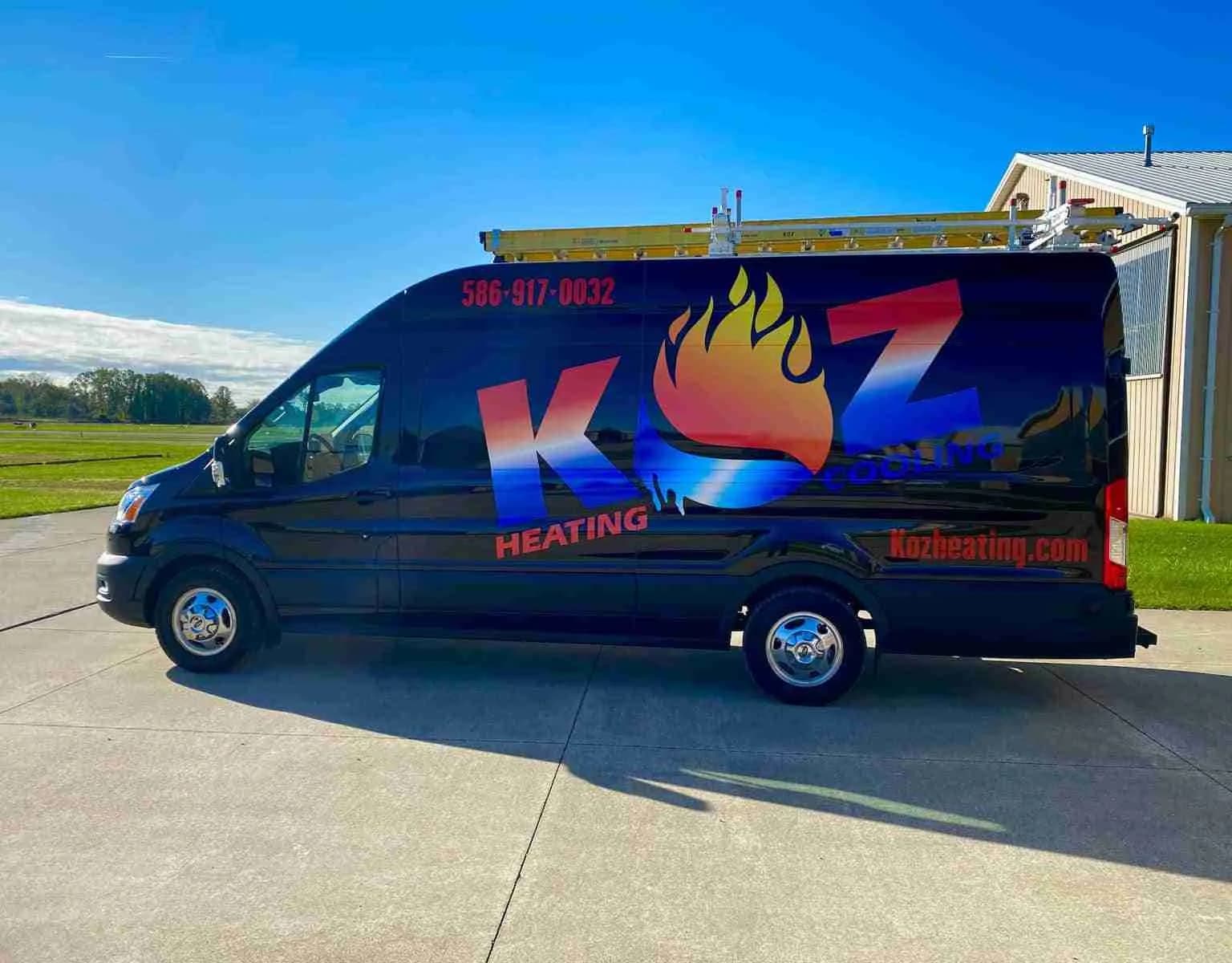Koz Heating & Cooling service van with the company's flame logo