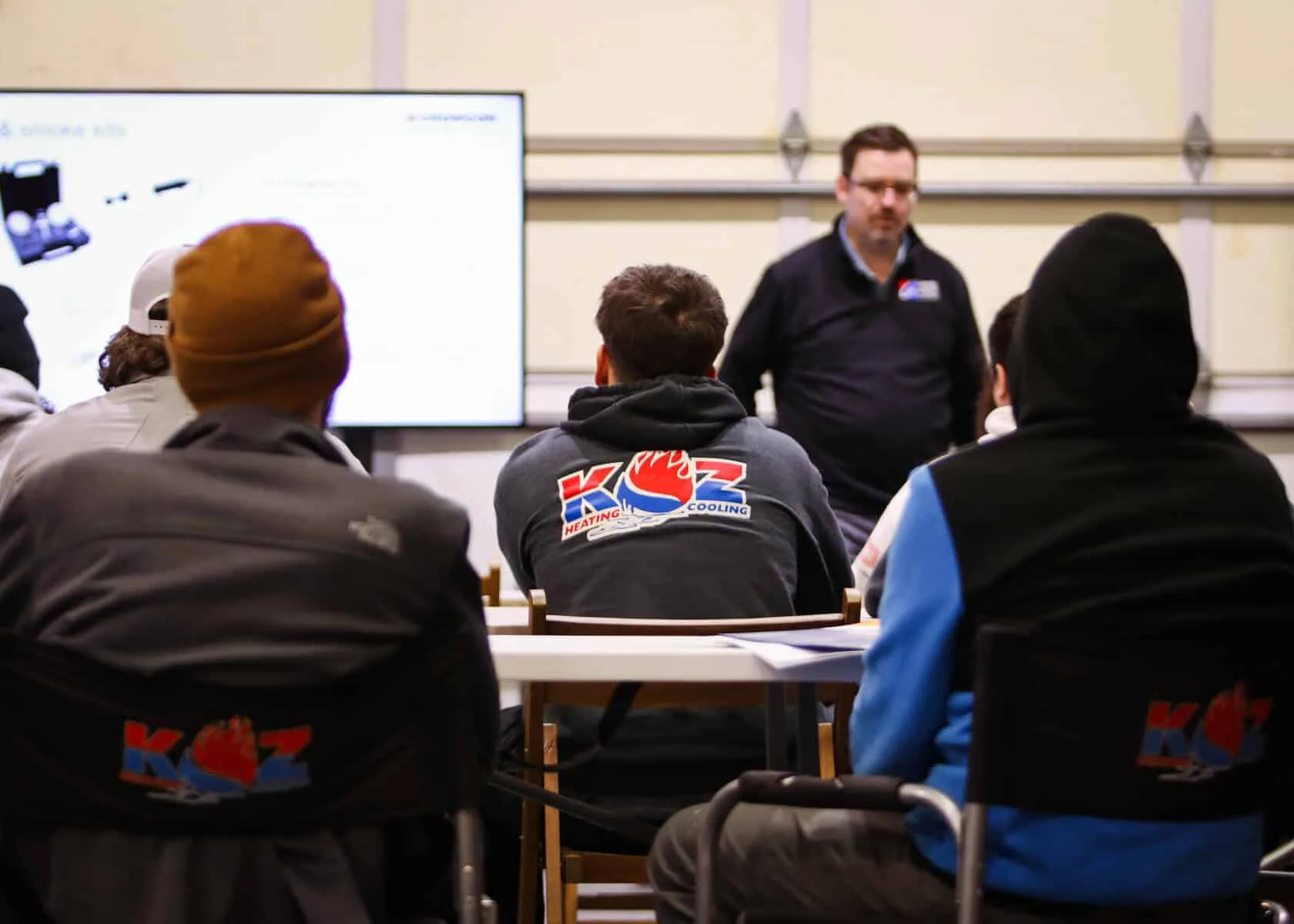 Koz technicians in a classroom HVAC training session
