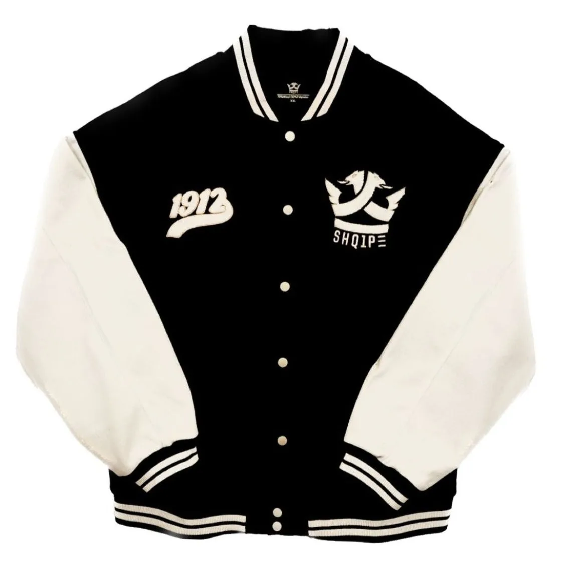 Black varsity jacket with white sleeves and the Shq1pe logo
