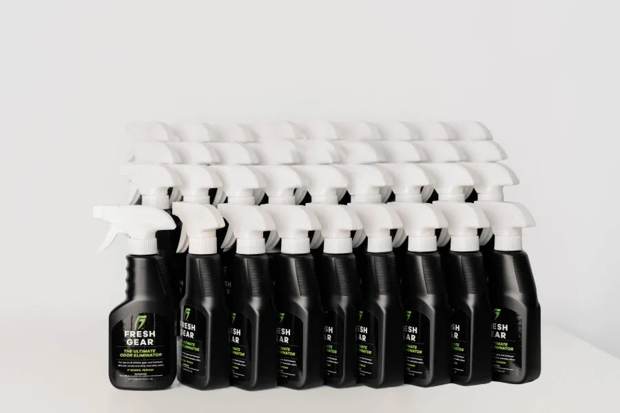 Rows of Fresh Gear spray bottles making up the 36-bottle team pack