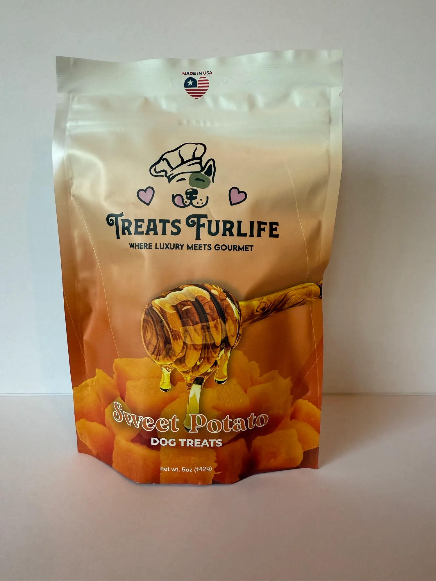 A bag of Treats Furlife Sweet Potato dog treats standing on a table