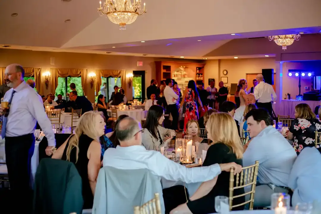 Guests dancing at an evening reception in the banquet hall